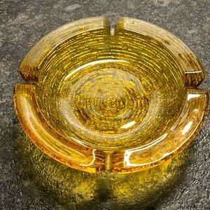 VINTAGE GLASS ASH TRAY. Amber gold color.  Excellent condition. Has 4 sp…